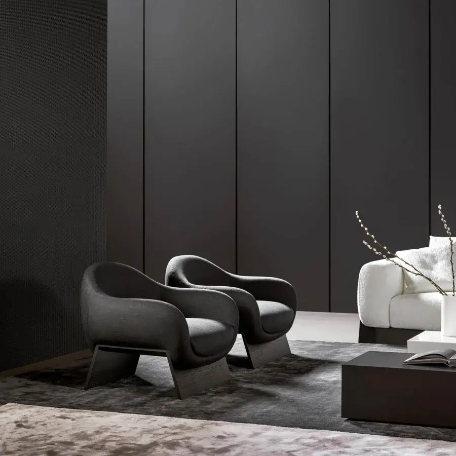 Elegant Bonaldo Boolean lounge chair upholstered in dark gray fabric with a veneered wood base