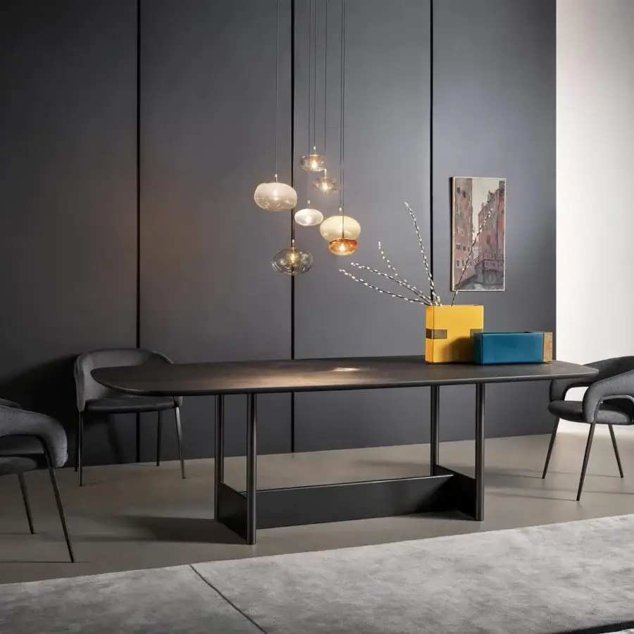 Innovative Bonaldo Alley armchair with gray fabric upholstery and a bold metallic structure creating a sleek silhouette