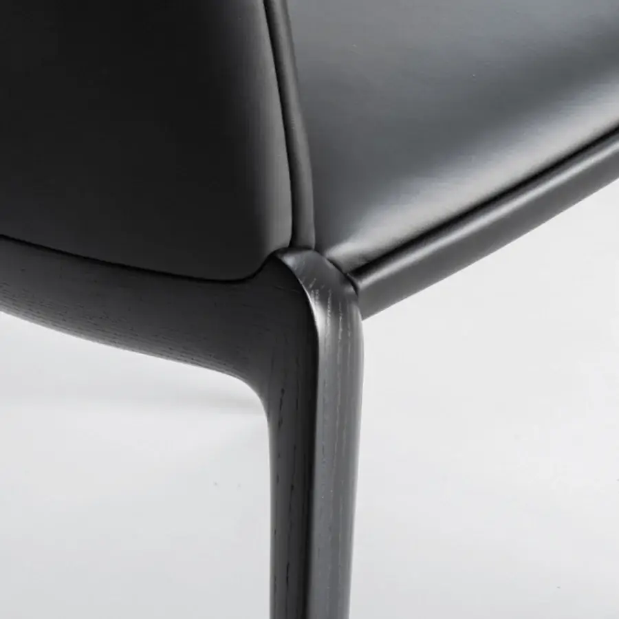 Sophisticated Potocco Hiru stool crafted in black leather or similar material with a helical dark-finished wood leg