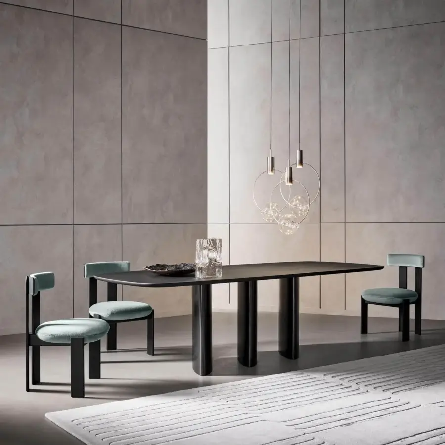 Harmonious Bonaldo Pi chair crafted in Italy with light blue textile cushions and dark matte wood finish