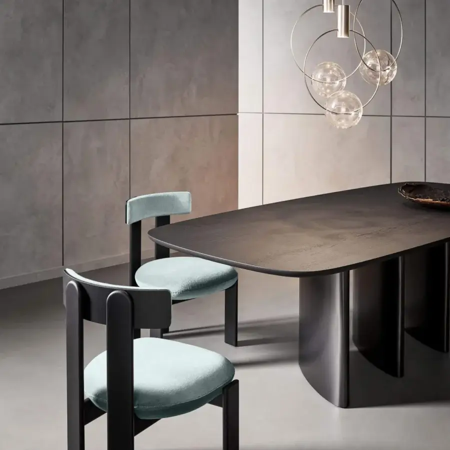 Exceptional Bonaldo Pi chair crafted in Italy with a matte black finish and light turquoise textile seat and backrest