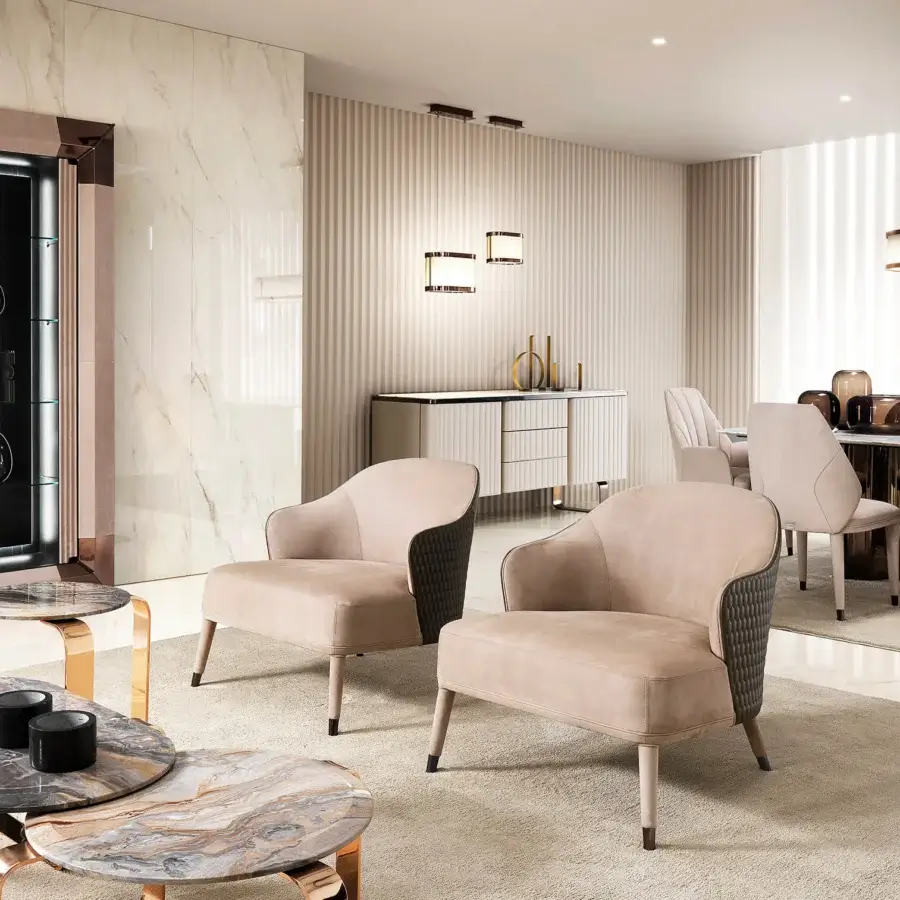 Distinguished DV Home Collection Manhattan lounge chair crafted in light beige leather with patterned textile and stainless steel legs