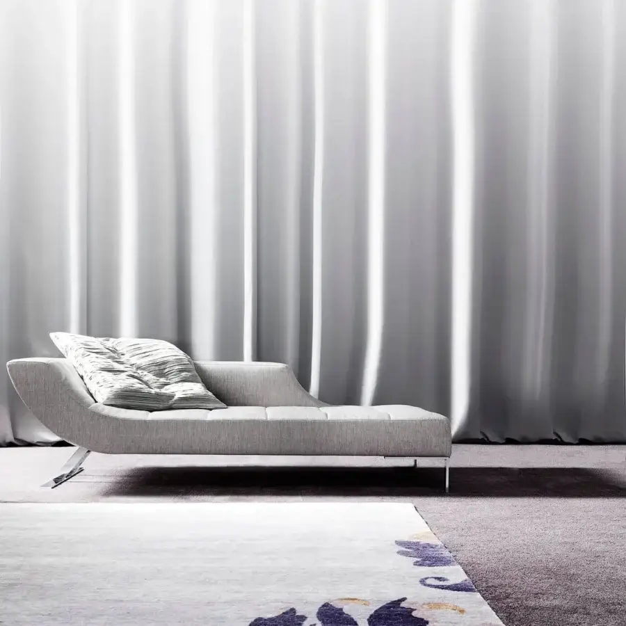 Distinguished Erba Viceversa chaise lounge with light gray fabric upholstery and satin matt chrome finished steel feet