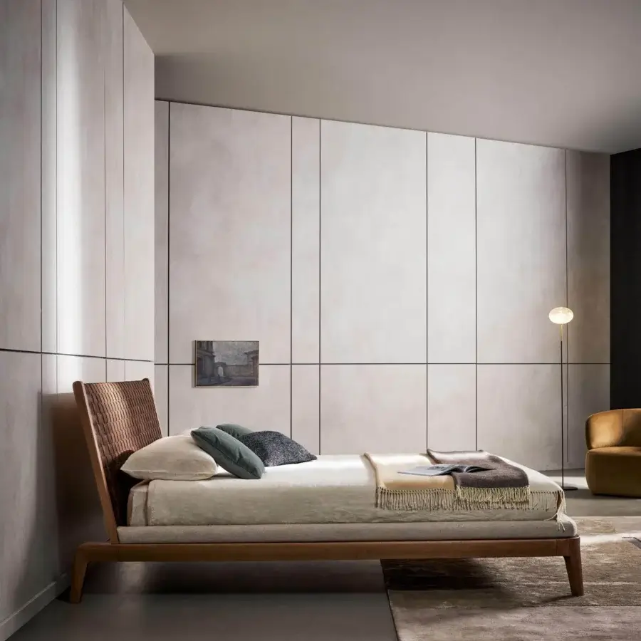 Distinguished Bonaldo Honeymoon bed crafted in Italy with woven full-grain light beige and medium brown leather within a solid wood structure