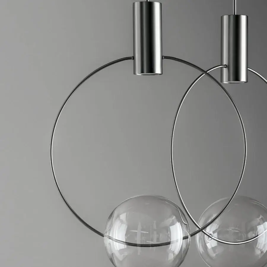 Exclusive Bonaldo Keshi suspension lamp with a transparent blown glass sphere and sleek silver metal structure with polished finish