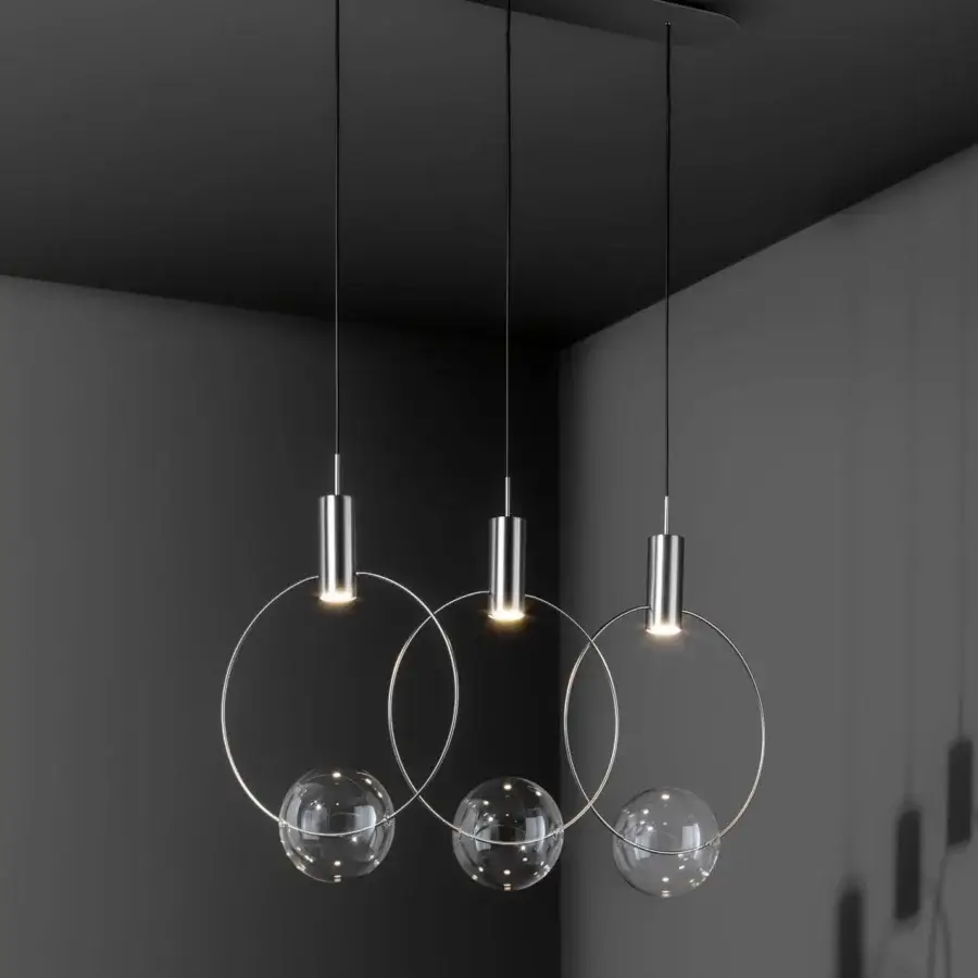 Distinguished Bonaldo Keshi suspension lamp with three pendants and polished metal rings holding transparent glass spheres