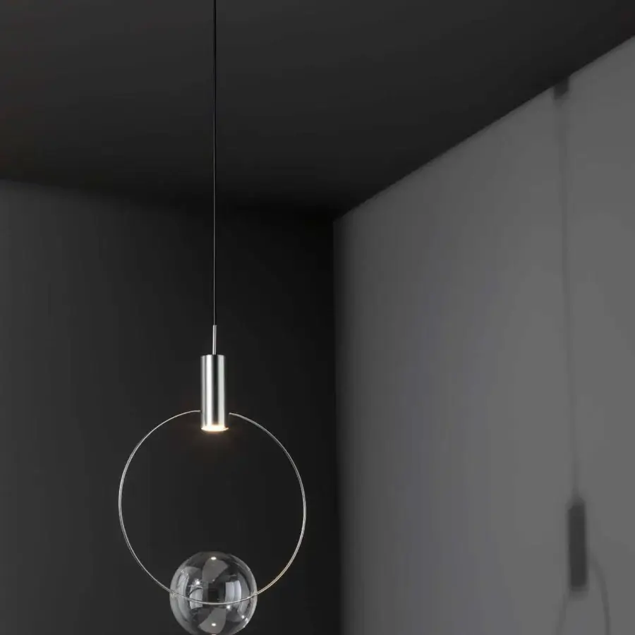 Elegant Bonaldo Keshi suspension lamp with a blown glass sphere held within polished silver-toned metal structure