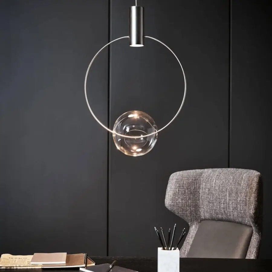 Superior Bonaldo Keshi suspension lamp with a sinuous transparent blown glass sphere and sleek silver metal structure