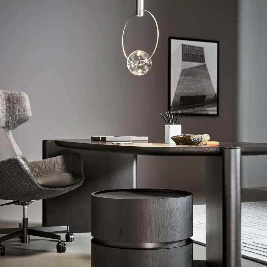 Captivating Bonaldo Keshi suspension lamp with a transparent blown glass sphere held within a circular metal structure and satin finish