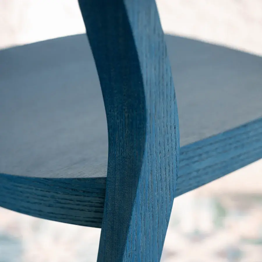Elegant Potocco Minima Wood Version chair in vibrant blue crafted with twisted solid ash wood legs and textured finish