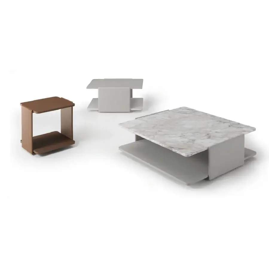 Exclusive 4 Mariani Sella coffee table with padded leather sides and a marble top exhibiting gray and white veining