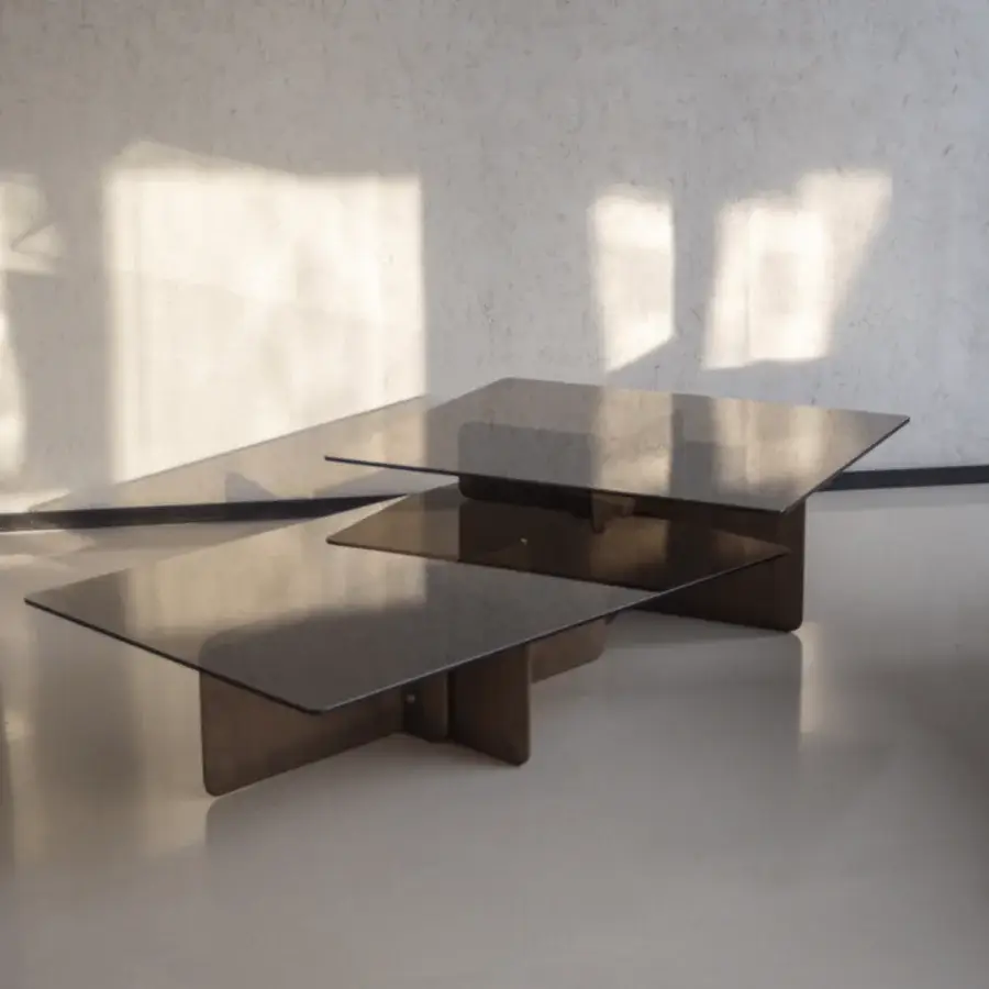 Elegant Potocco Shape coffee table with a multi-tiered square design and smooth dark material crafted in intersecting planes