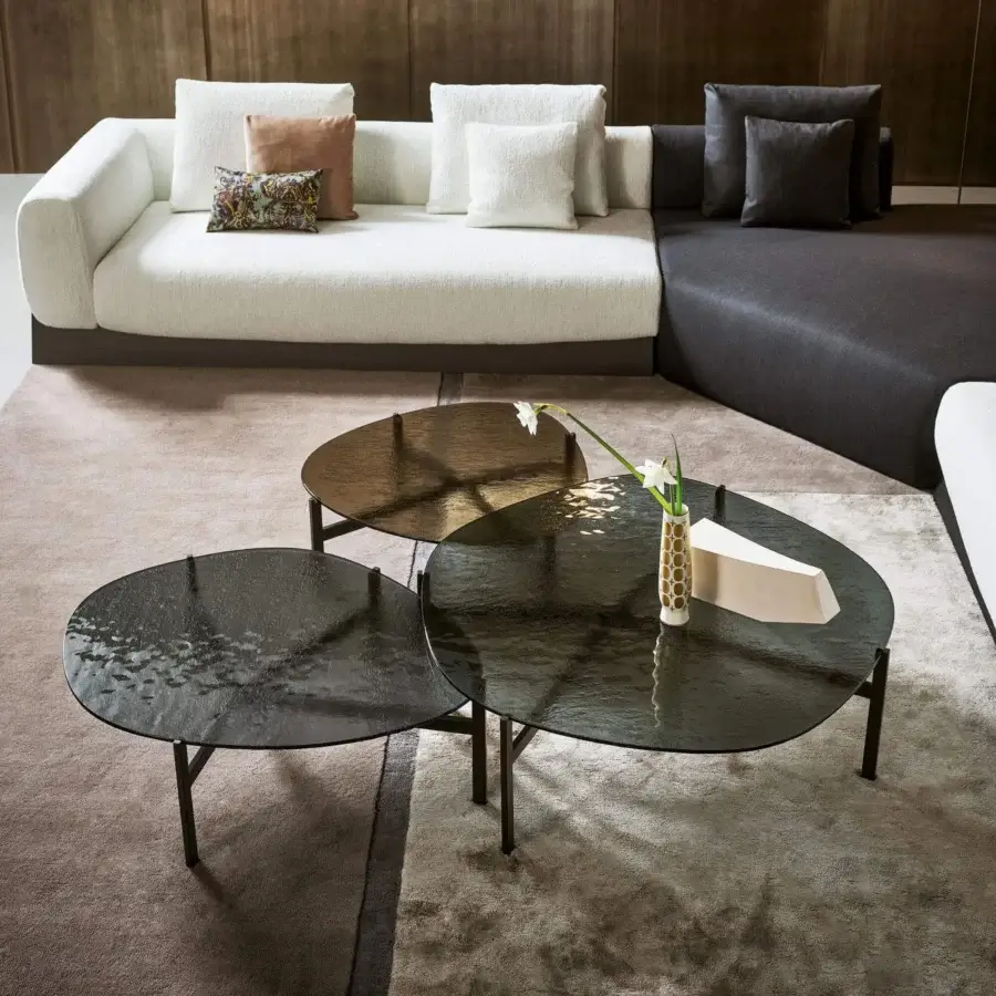 Distinguished Bonaldo Flac coffee table with rippled fused and tempered glass surfaces in smoky and bronze tints supported by a dark metal base