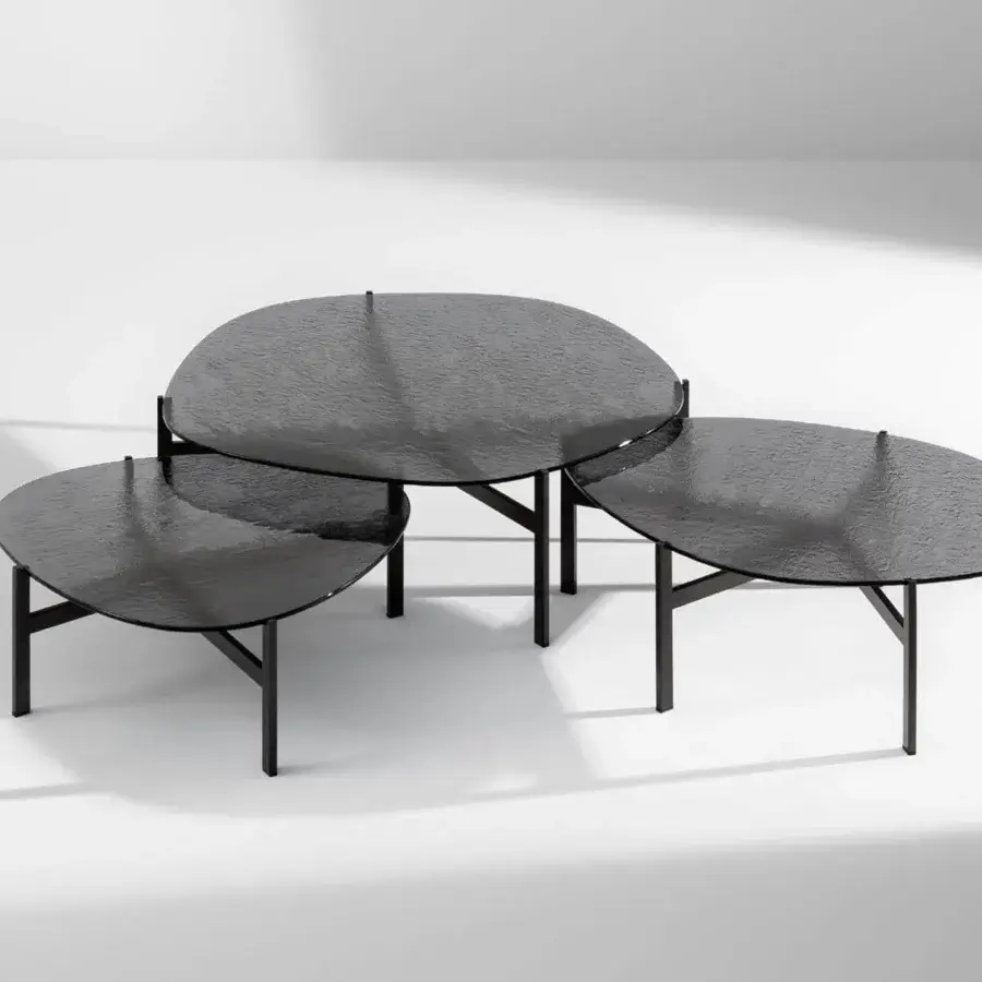 Distinctive Bonaldo Flac coffee table with fused and tempered glass evoking water and a matte black metal base