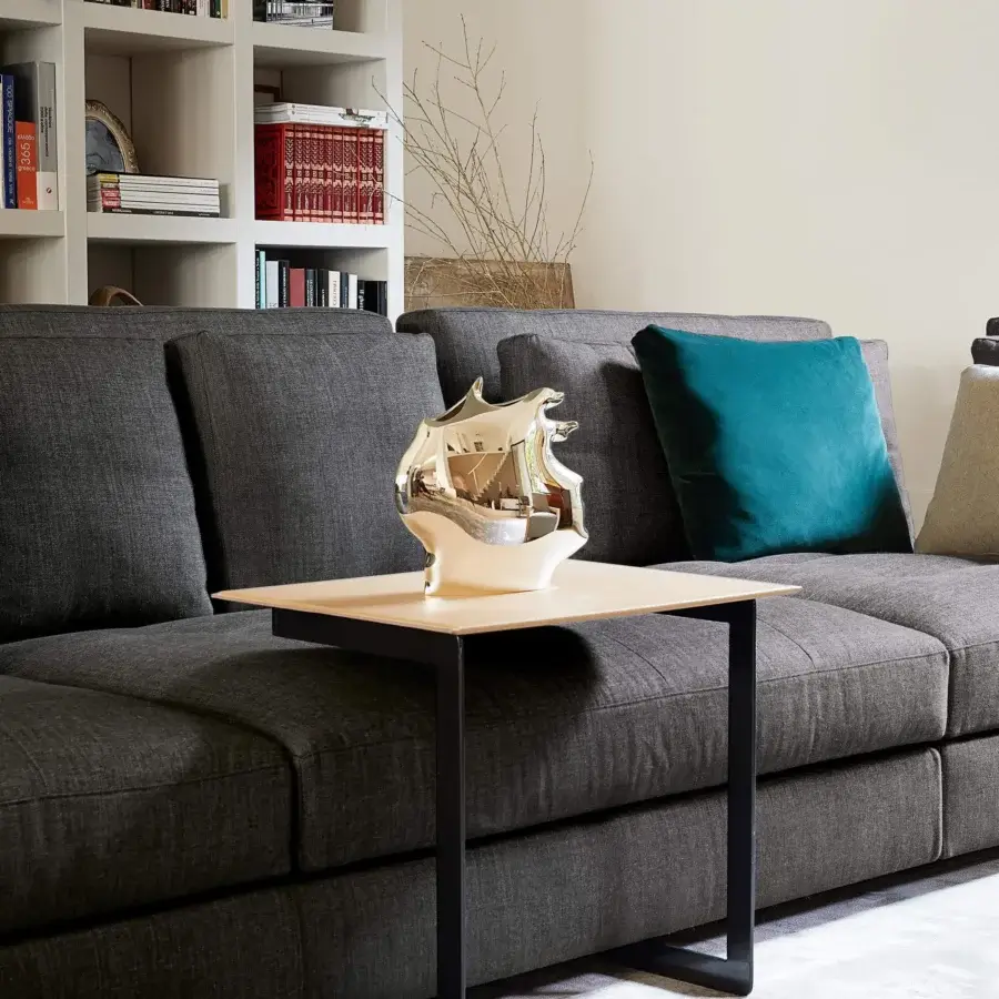 Distinguished Swan Italia Daiquiri side table with anthracite metal frame and light tan aluminum tabletop upholstered in beige hide