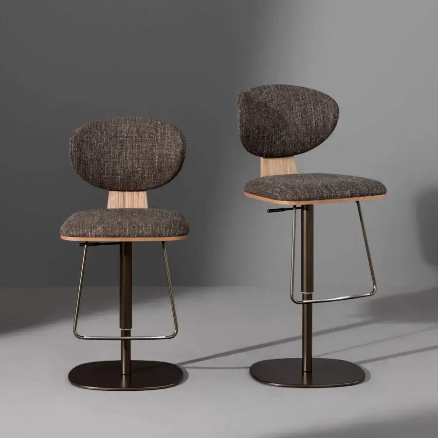Exceptional Bonaldo Olos stool with dark brown textured textile upholstery and light veneered wood elements built with a bronze-finished metal base