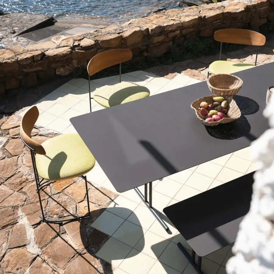 Elegant Potocco Graphic dining table with dark gray high pressure laminate and light gray painted metal legs