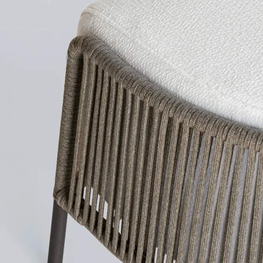 Superior Potocco Ola ottoman with hand-woven ribbon detail and powder-coated metal structure in warm brown or taupe hues