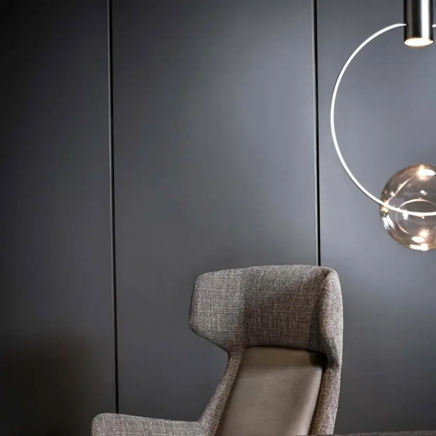 Elegant Bonaldo Newton armchair with a high woven gray backrest and smooth light brown upholstered seat on a black swivel base