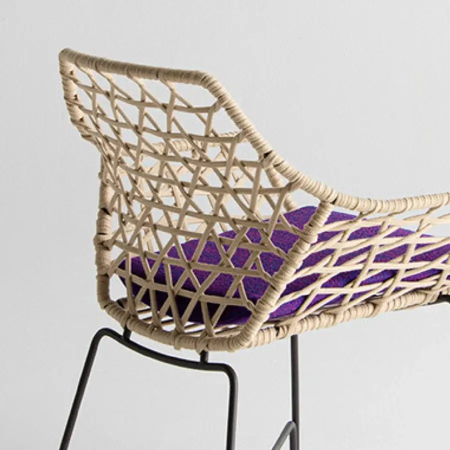 Distinguished Potocco Cut chair with woven tan fiber and sleek metal legs crafted in Italy with epoxy powder finish