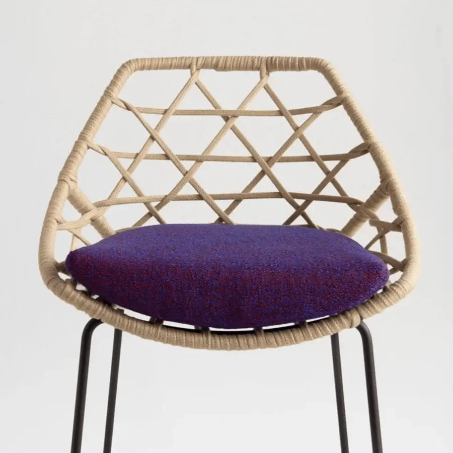 Elegant Potocco Cut stool with a hand-woven light beige shell and dark metal legs, built with a plush purple seat cushion