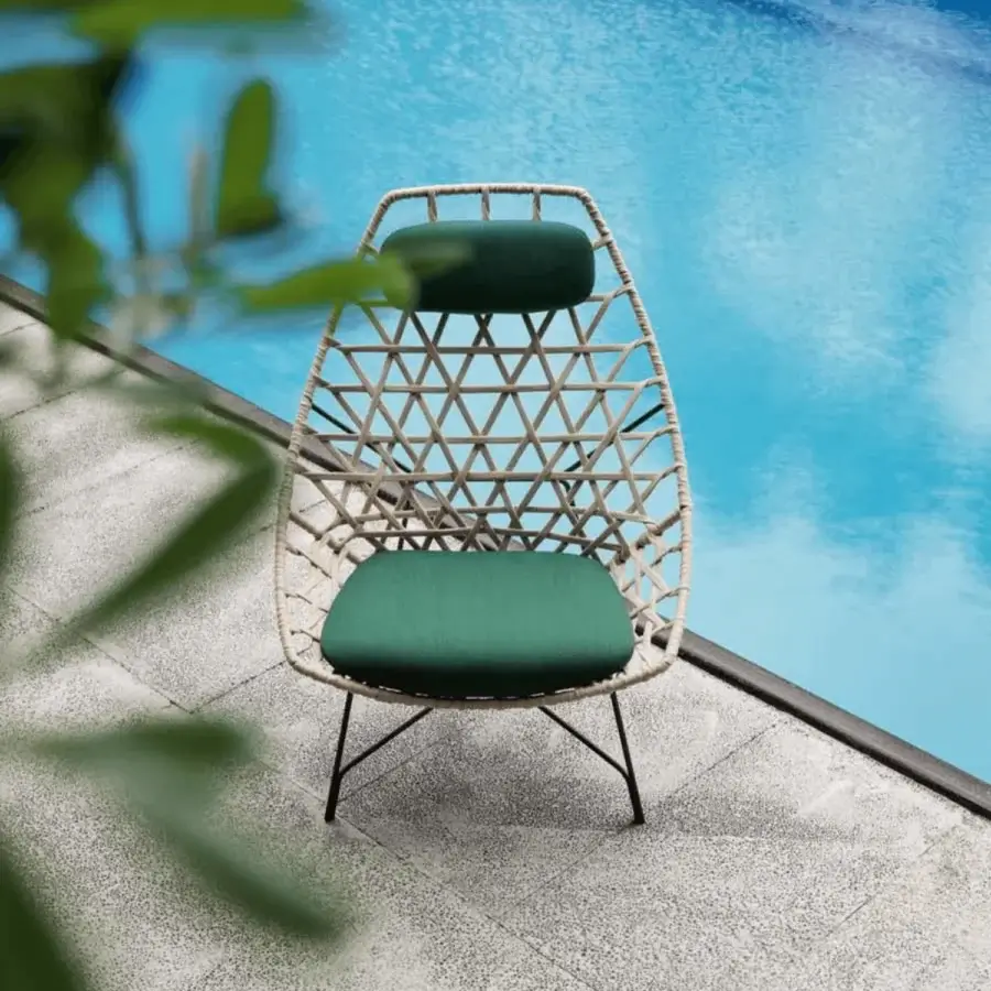 Distinguished Potocco Cut bergere with hand-woven beige gauze rope and lightweight epoxy powder-coated steel rod structure with verdant green cushions
