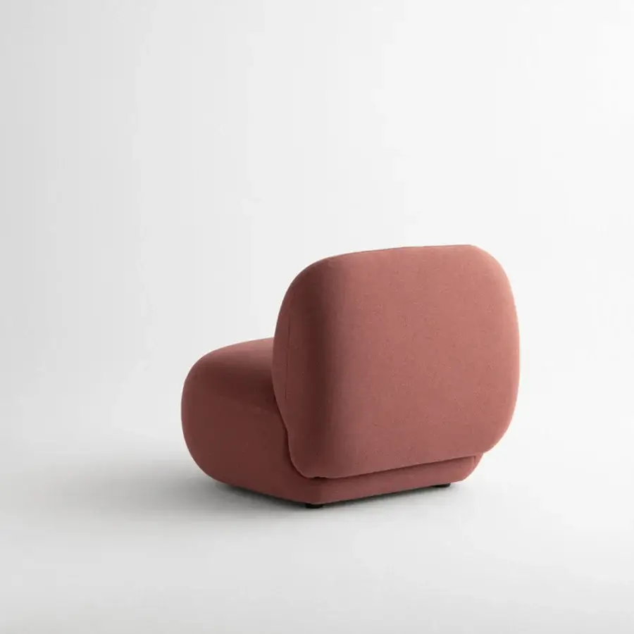 Sophisticated Potocco Jade lounge chair upholstered in reddish-brown polyurethane foam with sinuous organic shapes