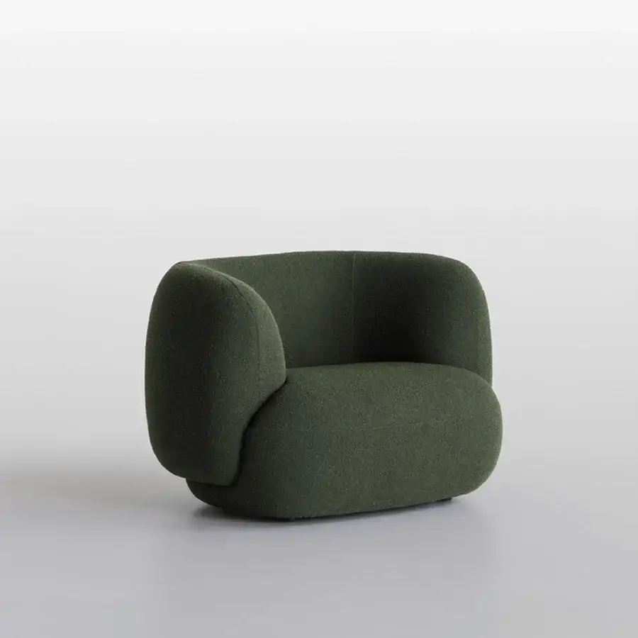 Sophisticated Potocco Jade lounge armchair crafted in Italy with dark green textile upholstery and rounded organic form