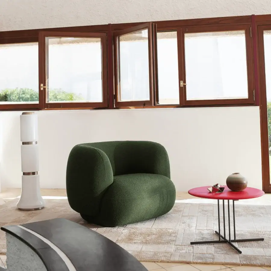 Exceptional Potocco Jade lounge armchair crafted in Italy with deep green textile and matte finish