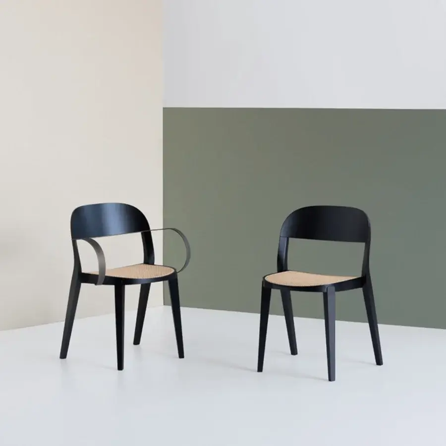Elegant Potocco Minima Vienna Straw Version chair with sinuous black matte wood frame and light durable straw seat
