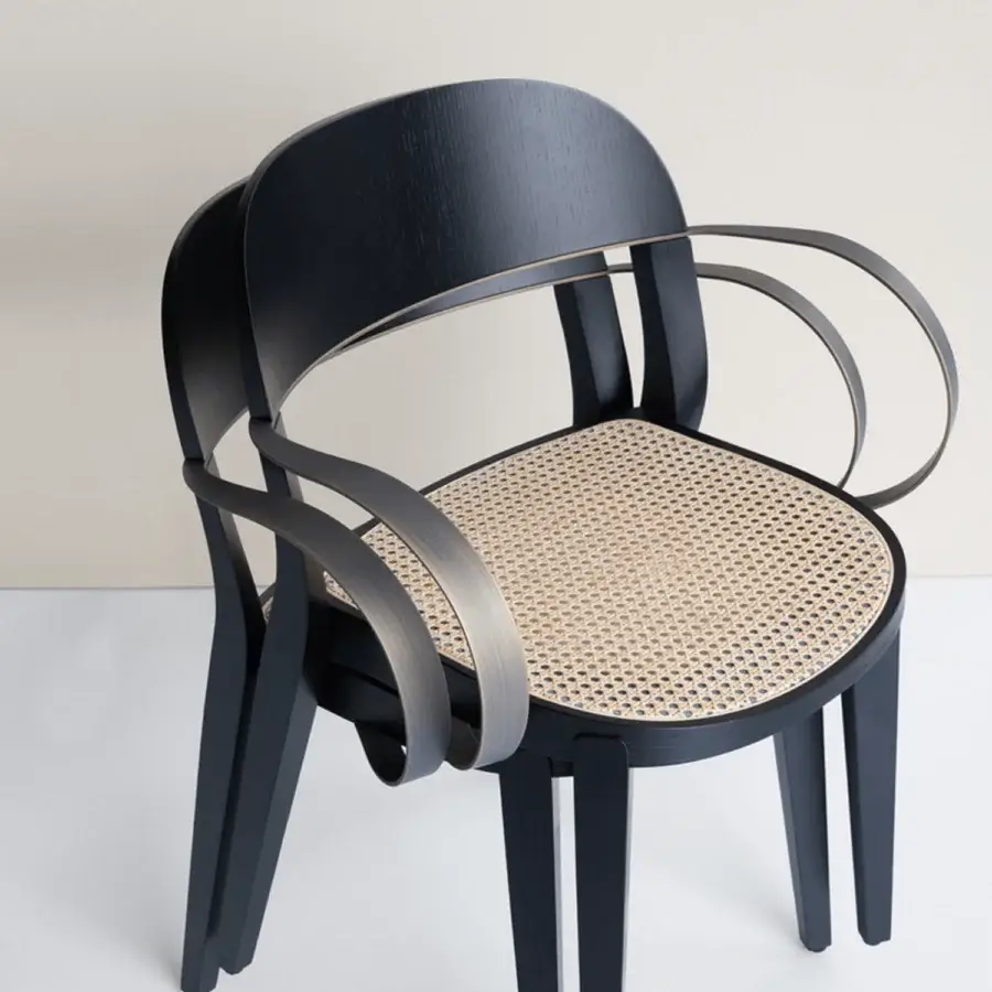 Distinguished Potocco Minima Vienna Straw Version chair with curved back and armrests in dark matte wood with light tan woven seat