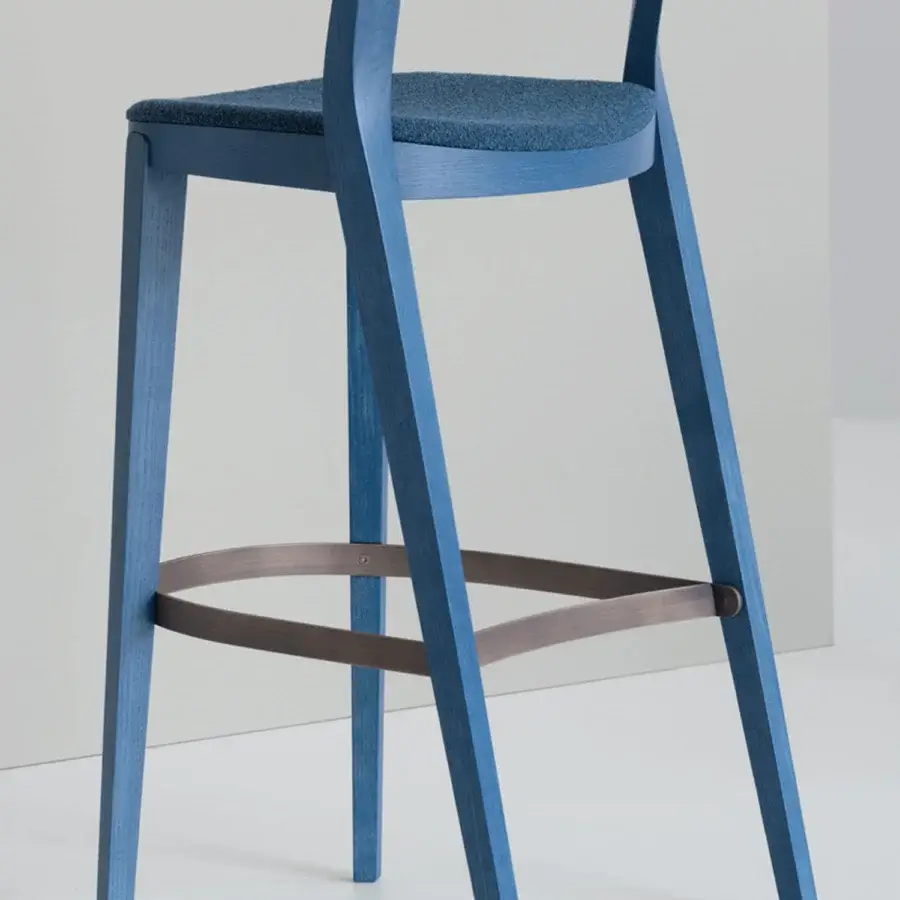 Elegant Potocco Minima stool with solid wood frame and upholstered seat in uniform blue with a brown footrest