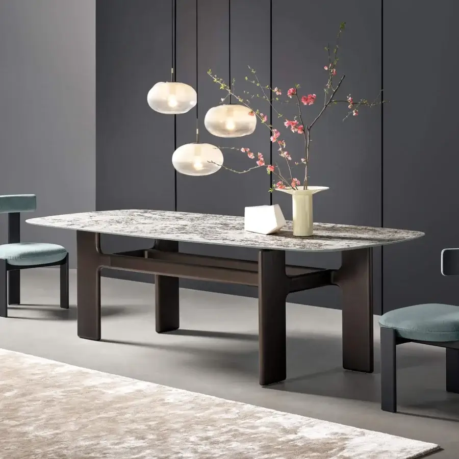 Sophisticated Bonaldo Hippos table with marble-patterned top and dark brown high density matt painted base presents changing visual strength
