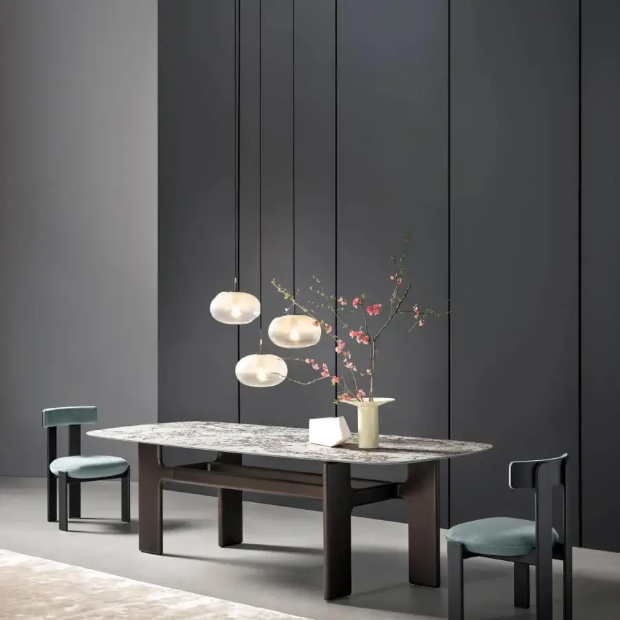 Exceptional Bonaldo Hippos table with dark brown painted polyurethane base and grey-white mottled stone-like composite tabletop