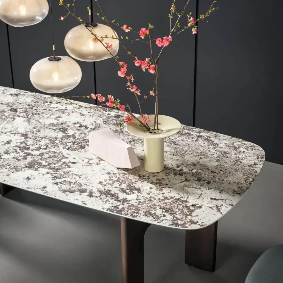 Distinguished Bonaldo Hippos table with a speckled white and gray top and matt dark painted polyurethane base