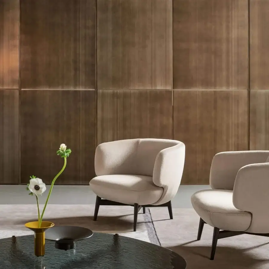 Distinctive Bonaldo Doge lounge chair in light beige textile with solid wood legs and matte finish