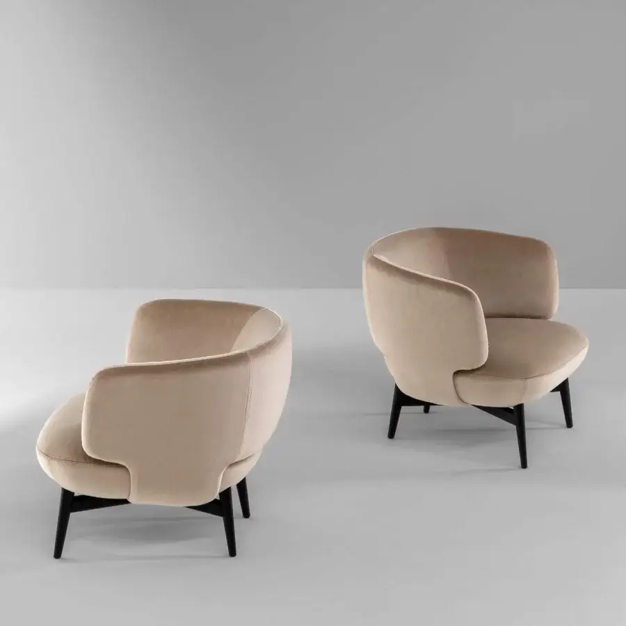 Exceptional Bonaldo Doge lounge chair in light beige textile with a solid wood, four-leg base crafted in Italy