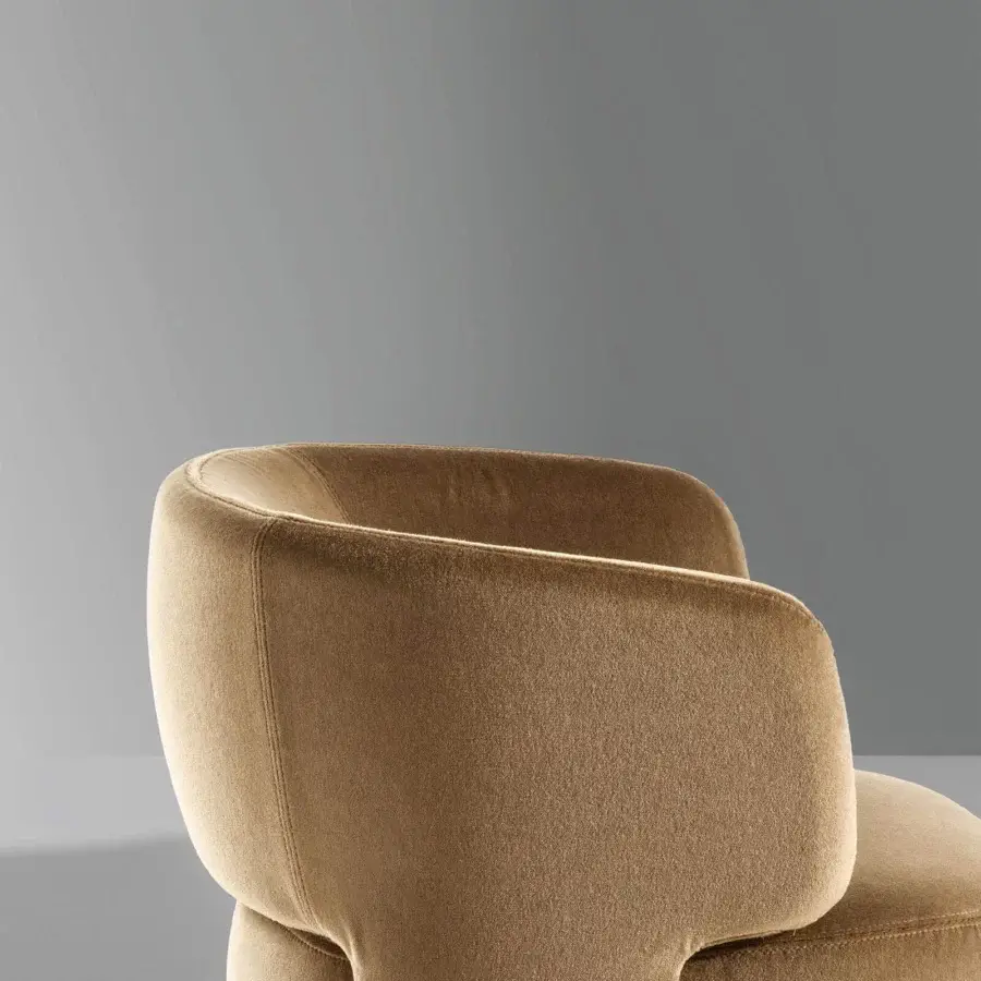 Superior Bonaldo Doge lounge chair with warm brown fabric upholstery and matte finish exhibiting curved shaping