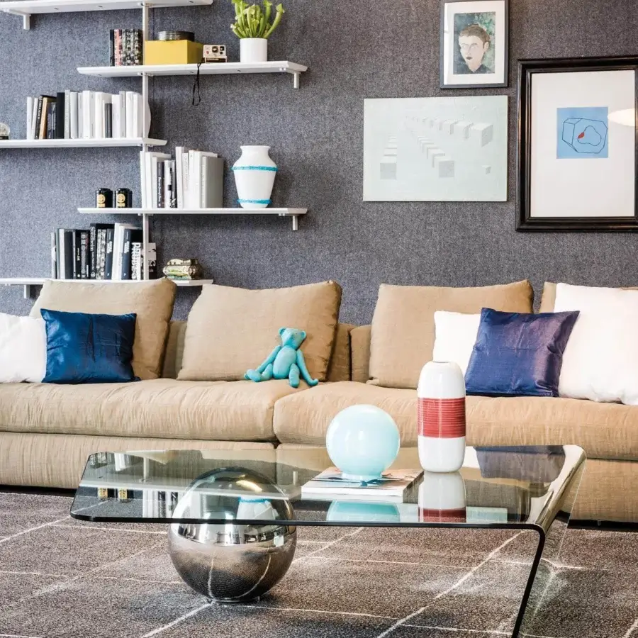 Distinguished Cattelan Italia Globe coffee table with curved clear glass top and shiny steel sphere base crafted in Italy