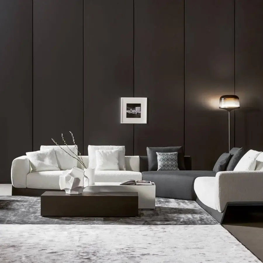 Sophisticated Bonaldo Boolean sectional with enveloping style, linear silhouette, and dark veneered wood base in light grays and browns