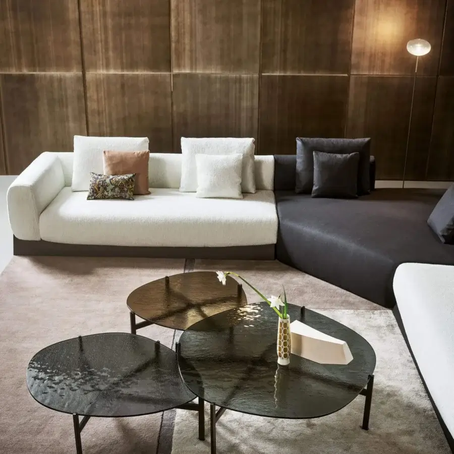 Distinguished Bonaldo Boolean sectional with dark veneered wood base, modular sections in white and dark gray textiles, and colorful pillows