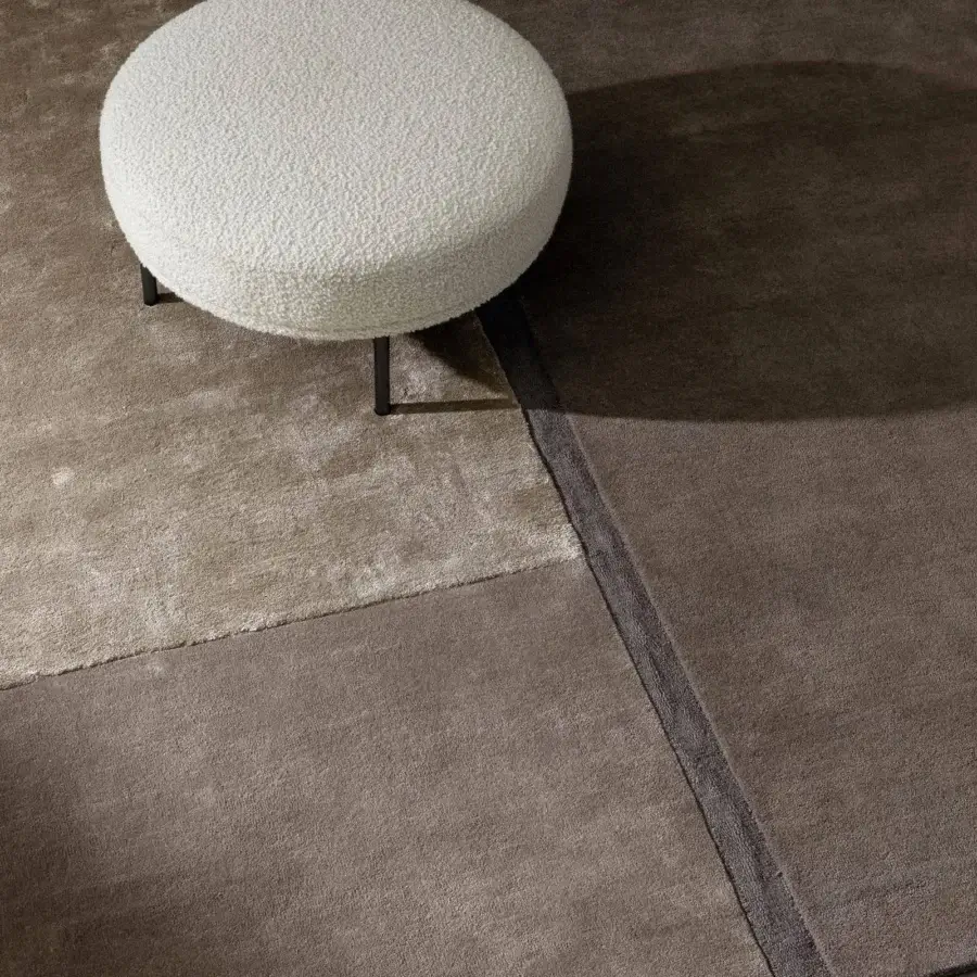 Exceptional Bonaldo Rabat rug showcasing a contemporary color block design in brown, tan, and taupe wool and Tencel with a matte finish