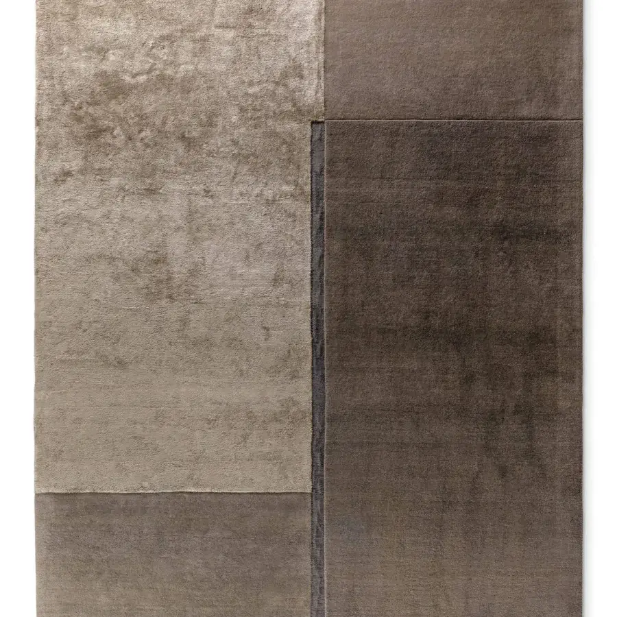 Superior Bonaldo Rabat rug displaying a captivating patchwork design in soft wool and Tencel with contrasting beige and brown sections