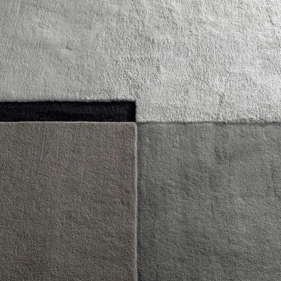 Lavish Bonaldo Rabat rug with geometric color blocking in black, light gray and dark gray wool and Tencel composition