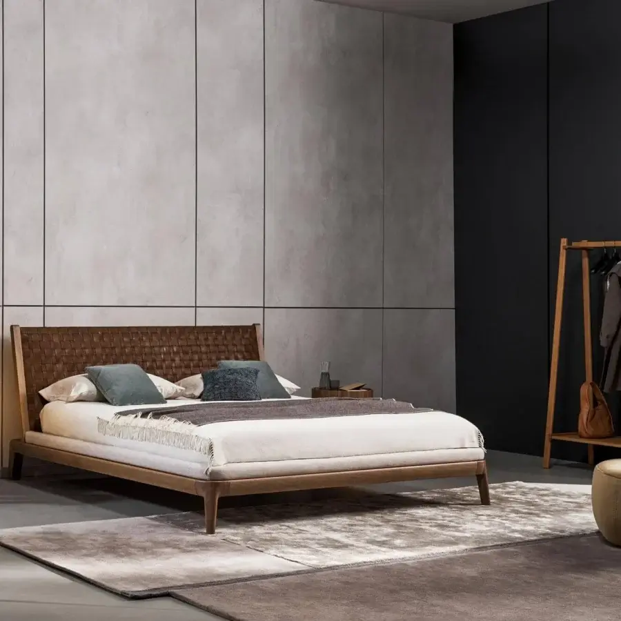 Distinguished Bonaldo Rabat rug crafted from wool and Tencel with blended browns and a dark brown border exhibiting a textured surface
