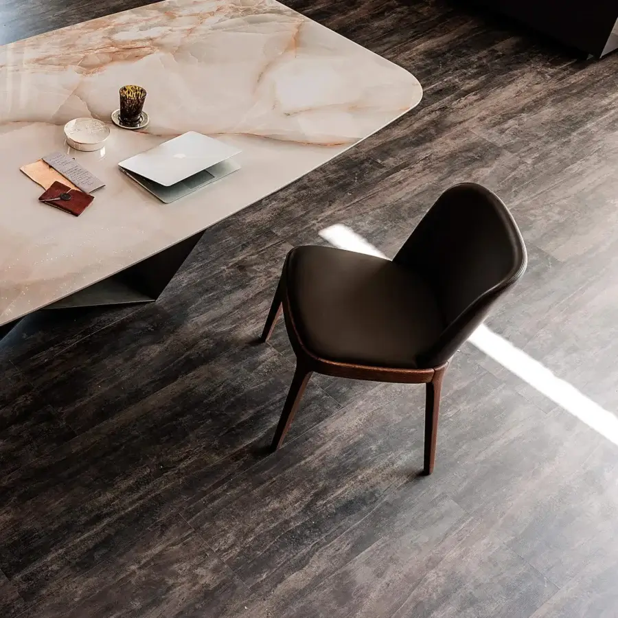 Distinguished Cattelan Italia Magda chair with comfortable form upholstered in dark brown leather and matte finish solid wood legs