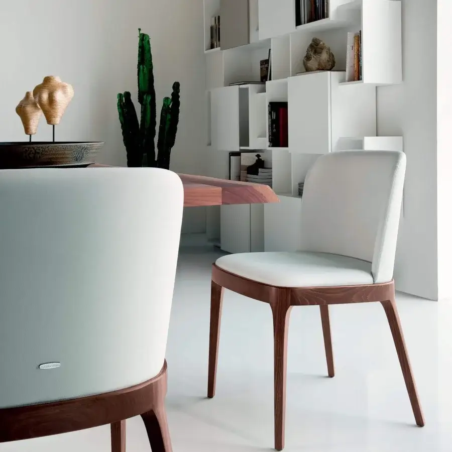 Exceptional Cattelan Italia Magda chair with enveloping white upholstery and brown finished solid wood legs