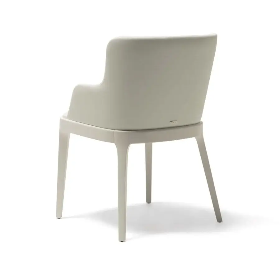 Distinguished Cattelan Italia Magda armchair upholstered in light grey synthetic material with integrated armrests and subtly tapered legs