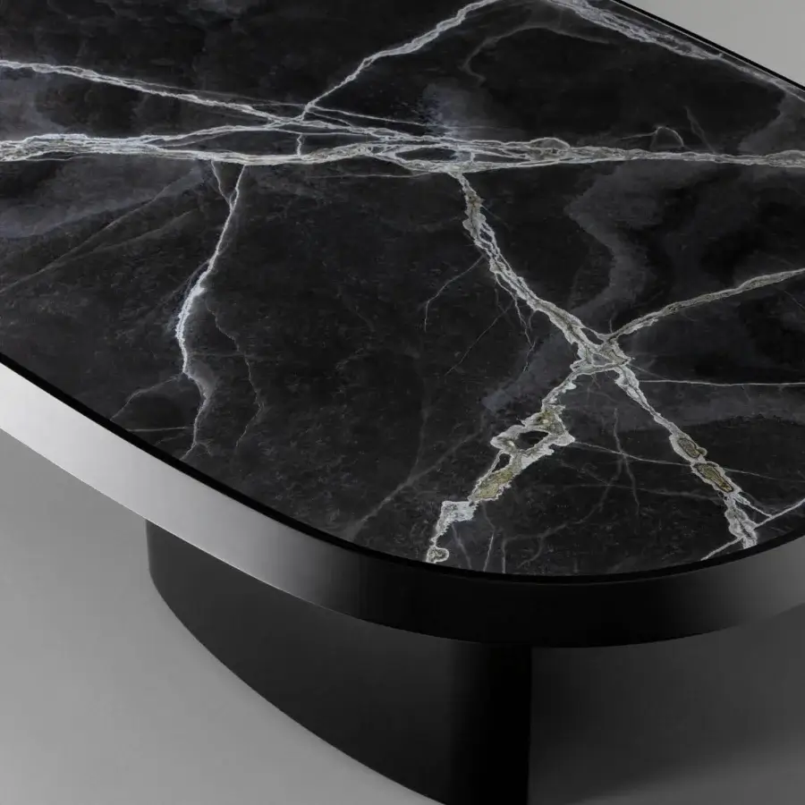Distinctive Bonaldo Padiglioni table with marble top displaying white and gold veining and matte black metal base
