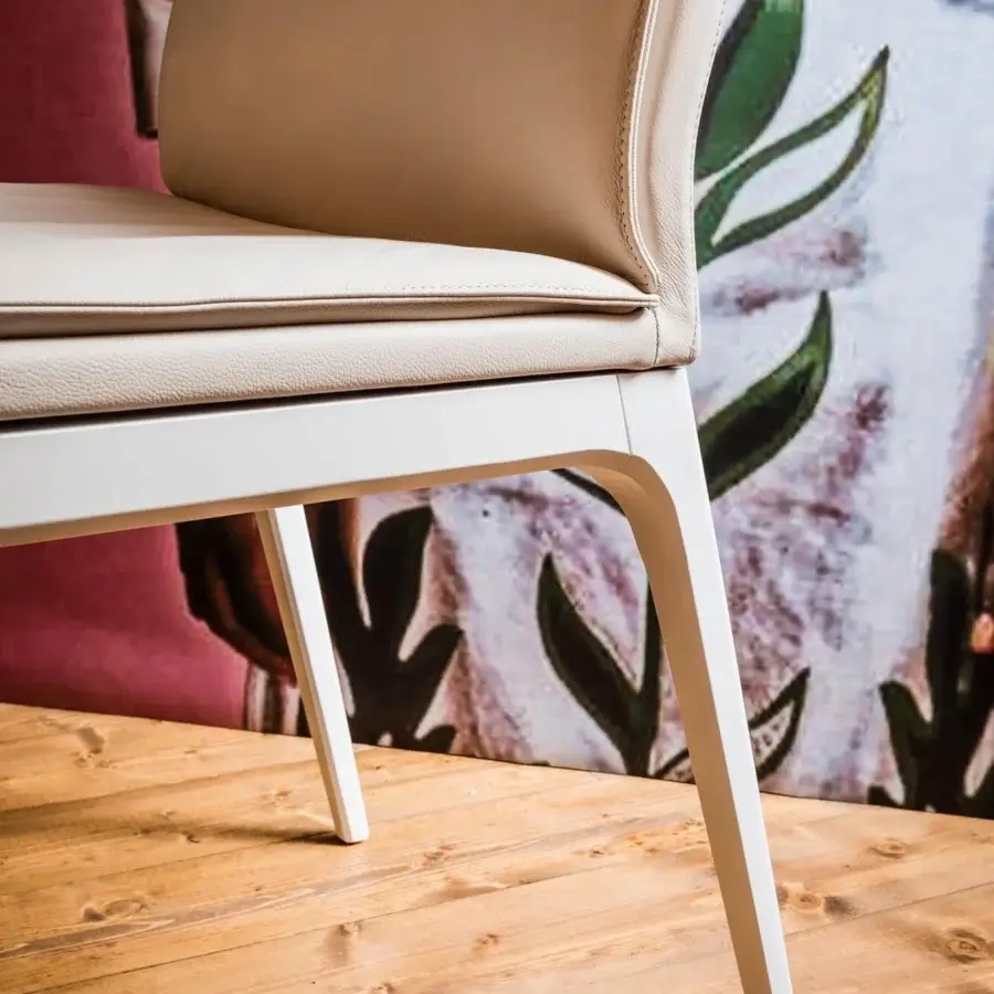 Sophisticated Cattelan Italia Sofia chair with matt white lacquered beech frame and light beige synthetic leather upholstery